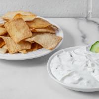 Mpf Side Tzatziki & Chips · Creamy cucumber & dill tzatziki sauce served with a  bag of Stacy's pita chips.