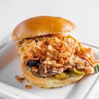 Rj Hot Honey Chicken Sandwich · Hot honey Pulled Chicken with Pickled Jalapeños, Tangy Slaw & Crispy Onions served on a Brio...