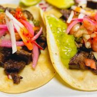 Tacos · Corn tortillas, any protein , cilantro, onions, and avocado sauce.