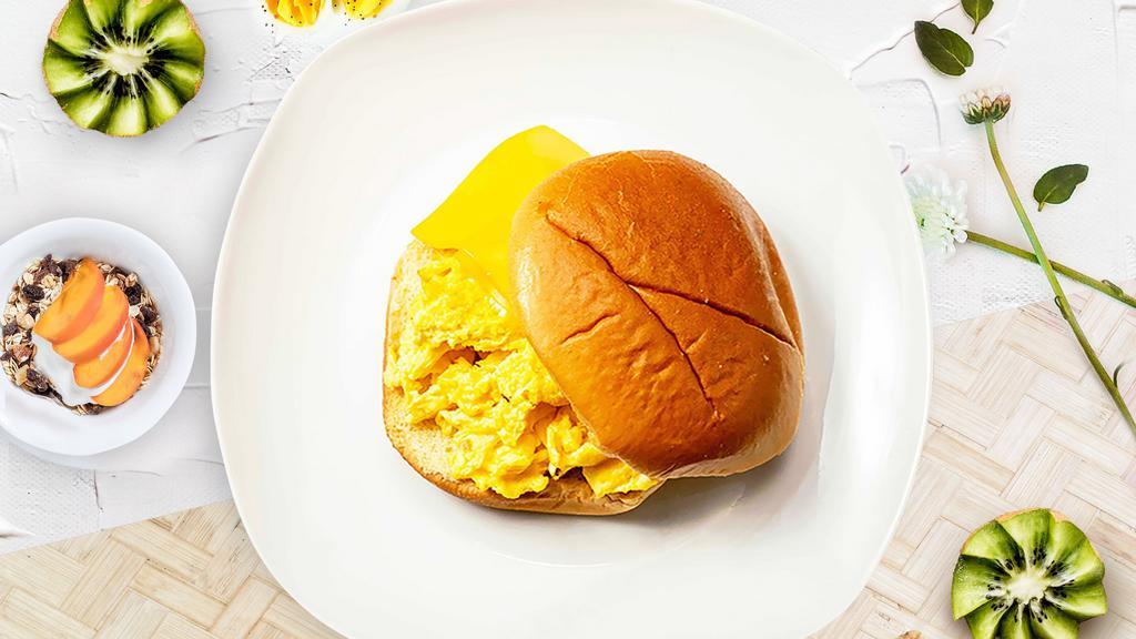Egg And Cheese Sandwich · Scrambled egg, and cheddar cheese served on a bread.