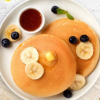 Back To Berry Banana Pancakes · Fluffy banana and berries pancakes cooked with care and love served with butter and maple sy...