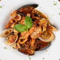 Zuppa Di Pesce Marechiara · Red sauce with scallops, shrimp, calamari, clams, mussels over linguini.
