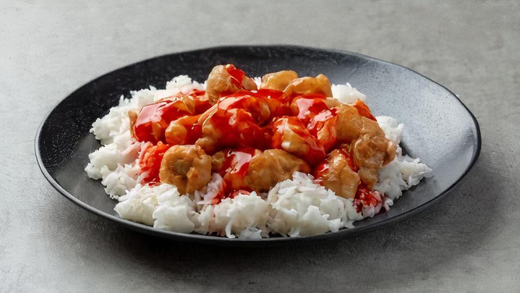 Sweet And Sour Chicken Combination Dinner · Served with pork fried rice and egg roll or soup.