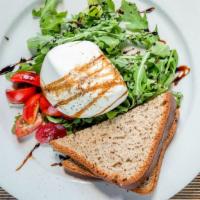 Fresh Burrata · Arugula, cherry tomato, and topped with balsamic reduction.