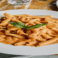Garganelli Alla Vodka · The pink sauce made with garlic, vodka, tomato, and a touch of cream.