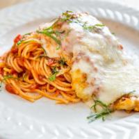 Spaghetti And Basilico · Served with fresh tomato and basil.