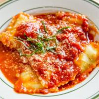 Spinach And Ricotta Ravioli · Served with a chosen sauce.