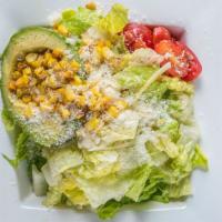 Avocado Salad · Romaine, roasted fresh corn, avocado, tomato, Parmigiano, and lemon vinaigrette.