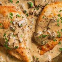 Chicken Marsala · Two grilled chicken cutlets homemade Marsala sauce and mushrooms served with mashed potatoes.