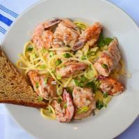 Seafood Pasta Special · salmon. Mussel, shrimp over handmade spaghetti in a light White wine creamy sauce.