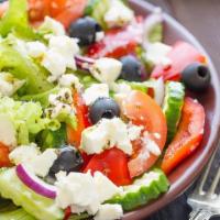 Greek Salad · Romaine, tomatoes, cucumbers, crumbled feta cheese, red onions, and kalamata olives. served ...