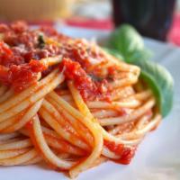 Classic Pasta · Choice of spaghetti or penne served in our classic red sauce or garlic and oil and side of g...