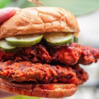 Nashville Hot & Spicy Chicken Burger (-) · Organic crispy chicken, nashville hot sauce, ranch, lettuce, tomatoes and pickles and side o...