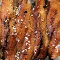 Unagi Don · Broiled eel over rice. Served with miso soup or salad.