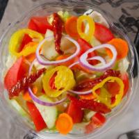 Tossed Salad · Lettuce, tomatoes, cucumber. carrots, onions, celery, dressing of your choice.