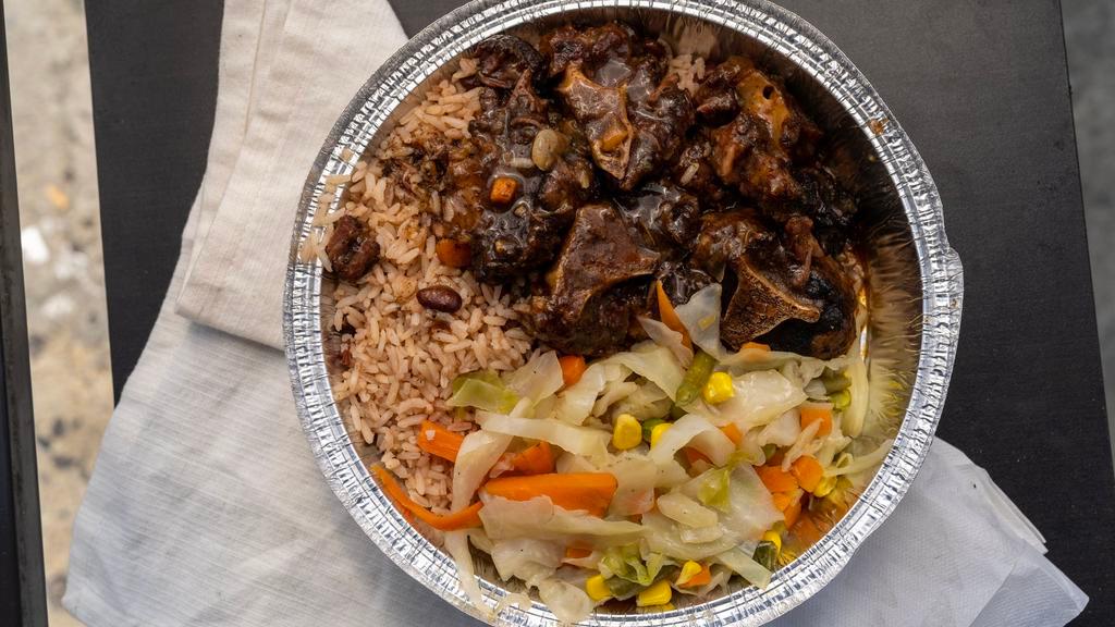 Oxtail Dinner · Served with choice of salad and side.