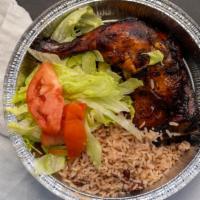 Jerk Chicken Dinner · Served with choice of salad and side.