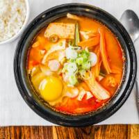 Soondubu Soup · Soft tofu soup with mixed vegetables, scrambled eggs and hot pepper powder. Served with whit...