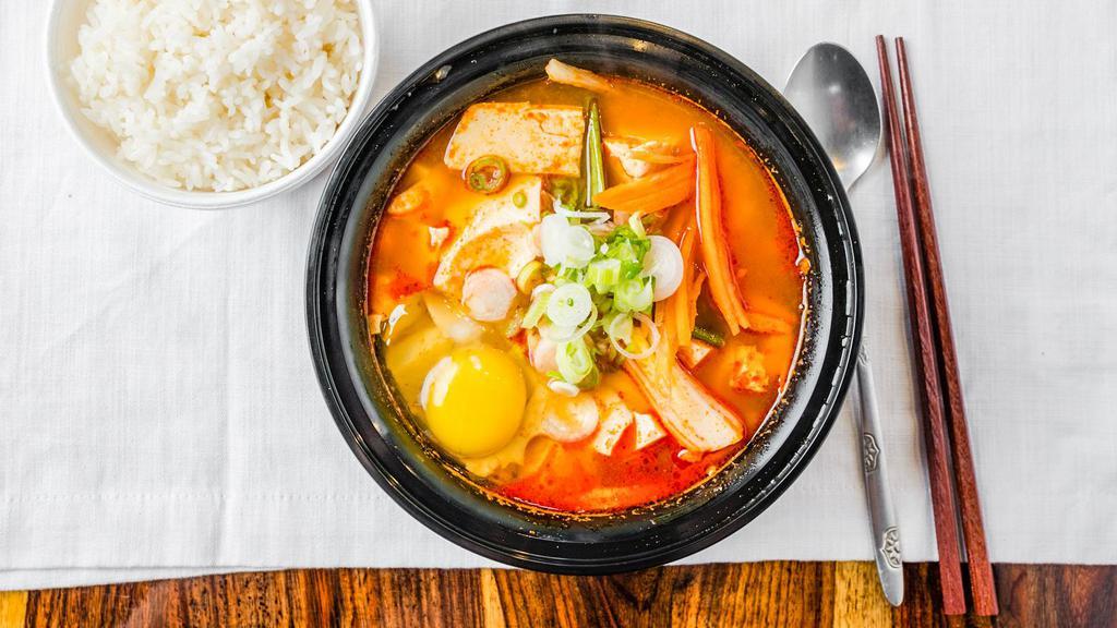 Soondubu Soup · Soft tofu soup with mixed vegetables, scrambled eggs and hot pepper powder. Served with white rice on the side.