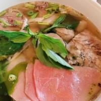 Phở Đặc Biệt (Combination) · Chef's 20 years experience of making this signature pho broth. 12-Hour cook time beef bones,...