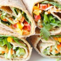 Veggie Wrap · Three eggs with broccoli, peppers, onions and mushrooms.