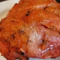Tandoori Chicken · A chicken delicately marinated overnight in fresh aromatic indian spices and herbs cooked in...