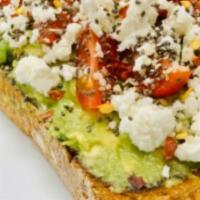 Avocado Toast · Guacamole, toasted pumpkin seeds and crushed red chili flakes on seven grain bread. Side of ...