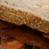Blt Sourdough Sandwich. · Our probiotic sourdough, smokey vegan seitan bacon, lettuce mix, garlic aioli,& juicy tomato...