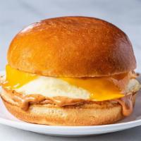 Brioche Sandwich · Warm buttery brioche bun filled with a cheesy egg patty.