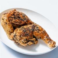 Classic Herb Roasted Chicken · This tender seared half chicken is paired with warm chicken jus served with farro pilaf.