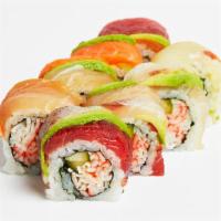 Rainbow Roll · California roll topped with albacore, tuna, white fish, salmon, shrimp, and avocado.