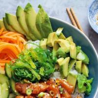 Poke Bowl · Served with crabmeat, avocado, seaweed, salad, lettuce, carrot, masago and rice.