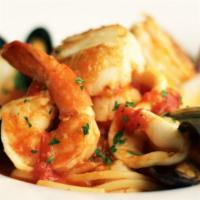 Linguini Marechiaro · Clams, mussels, calamari, scallops & jumbo shrimp tossed in a white wine tomato sauce