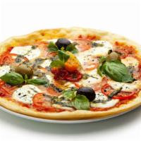 Pesto Pizza · Freshly baked pizza made with a homemade pesto sauce base, and topped with fresh Mozzarella ...