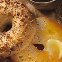 Bagel With Butter · Boiled and baked round bread roll.