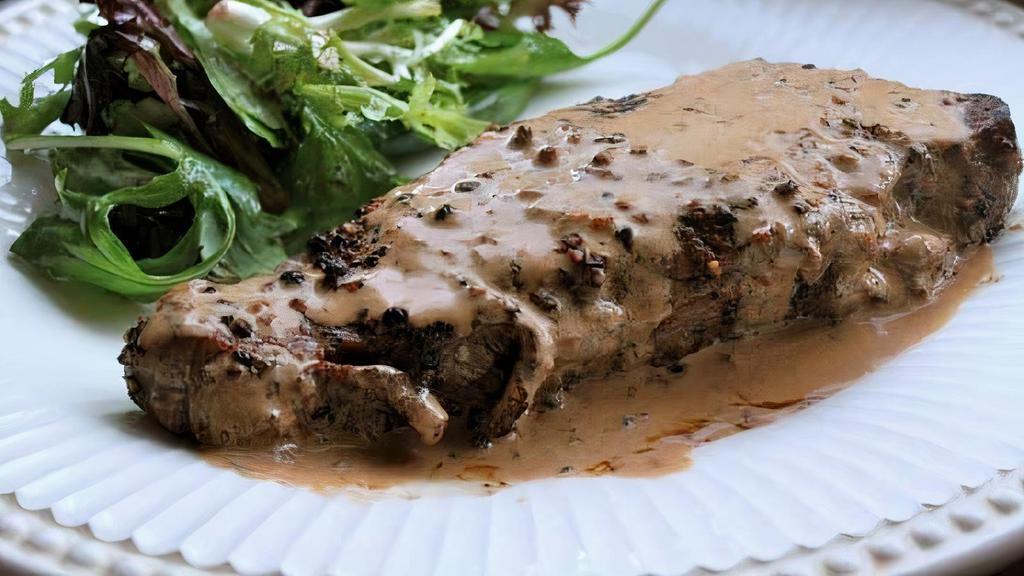 Steak Au Poivre · Served with French fries, kale greens and peppercorn sauce.