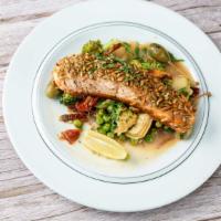 Crusted Salmon · Pumpkin seed crusted salmon, pan-seared, served with French beans, artichokes, sun-dried tom...