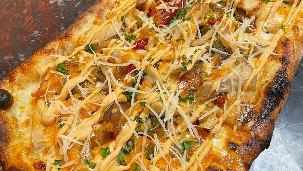 That'S Spicy Pizzette (Personal) · Grilled Chicken or spicy pork, long hots, pepperoni, onion, and chipotle sauce.