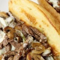 Cheese Steak · Steak, provolone cheese, fried onions and peppers.