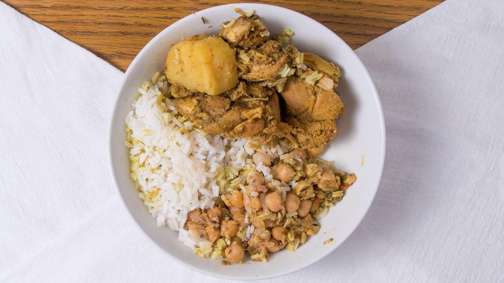 Chicken Curry With White Rice · Mildly spiced curry, simmered with boneless chicken and potatoes served with enriched white rice.
