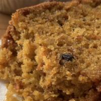 Carrot Cake · Baked cake made of minced fresh carrots mixed k with walnuts and raisins.