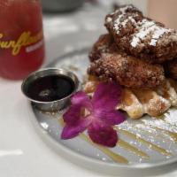 Chicken & Waffles · Cage-free fried chicken, Mike’s hot honey on a Belgian waffle.