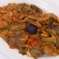 Eggplant With Tomato Sauce · Cubes of eggplant in a rich tomato sauce with red and green bell pepper, onion and garlic.