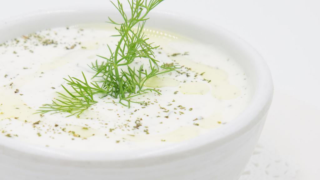 Cacık · Home-made yogurt blended with finely chopped kirby cucumber, garlic, dill, fresh mint.
