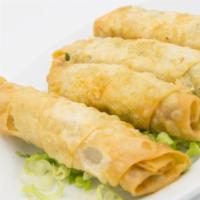 Cheese Roll · Crispy filo dough stuffed with feta cheese and parsley.