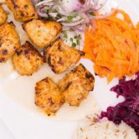 Chicken Shish Kebab · Tender cubes of marinated in our chef's unique seasonings and char-grilled to perfection on ...