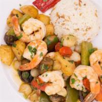 Bosphorus Shrimp Shish · Marinated shrimp grilled on skewers then served with rice and sauteed chefs selection vegeta...