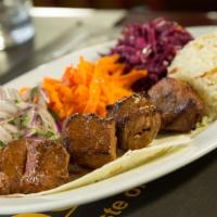 Lunch Lamb Shish Kebab · Tender cubes of lamb marinated in our chef's unique seasonings and char-grilled to perfectio...