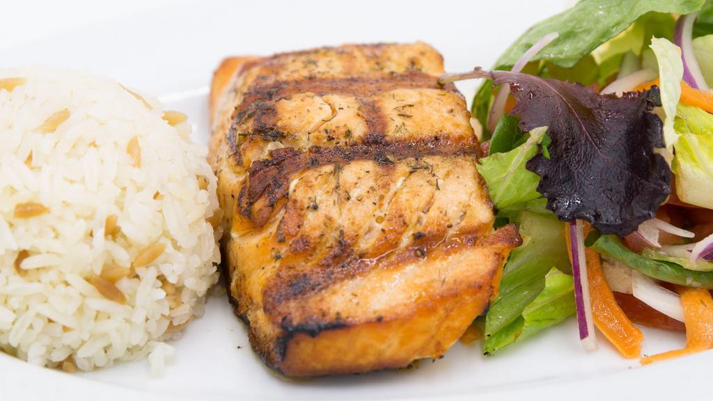 Lunch Salmon Grill · Salmon seasoned with our special spices, served with  jasmine rice and green garnish