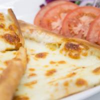 Mozarella Pide Dinner · A crispy crust of dough topped with mozzarella cheese, bell pepper and tomato.
